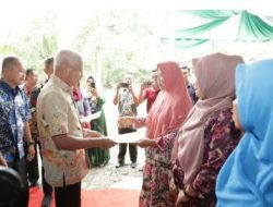 Bupati Asahan Hadiri Pembinaan Kampung KB, Penyerahan Akte Kelahiran, Santunan Anak Yatim dan Kursi Roda