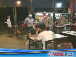 Polsek Percut Sei Tuan Bubarkan Masyarakat yang Berkumpul Untuk Mengantisipasi Penyebaran Covid-19