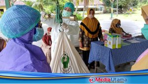 Ikuti Protokol Kesehatan, TP. PKK Kecamatan Kisbar dan Uptd Puskesmas Sidodadi Gelar Posyandu Gabungan 