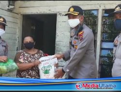 Kapolsek Percut Sei Tuan Bantu Korban Angin Puting Beliung
