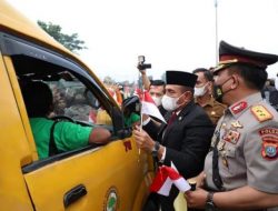 Semarakkan HUT ke 77 Kemerdekaan RI, Polda Sumut Bagi-Bagikan 30.000 Bendera Merah Putih