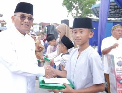 Buka Puasa Bersama Warga Sidamanik, Bupati Anton Saragih Santuni Anak Yatim dan Serahkan Bantuan Masjid