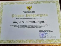 Bupati Simalungun Terima Penghargaan Kemendagri atas Kepedulian Bantu Aceh Utara